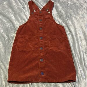 Kids cute dress with buttons.